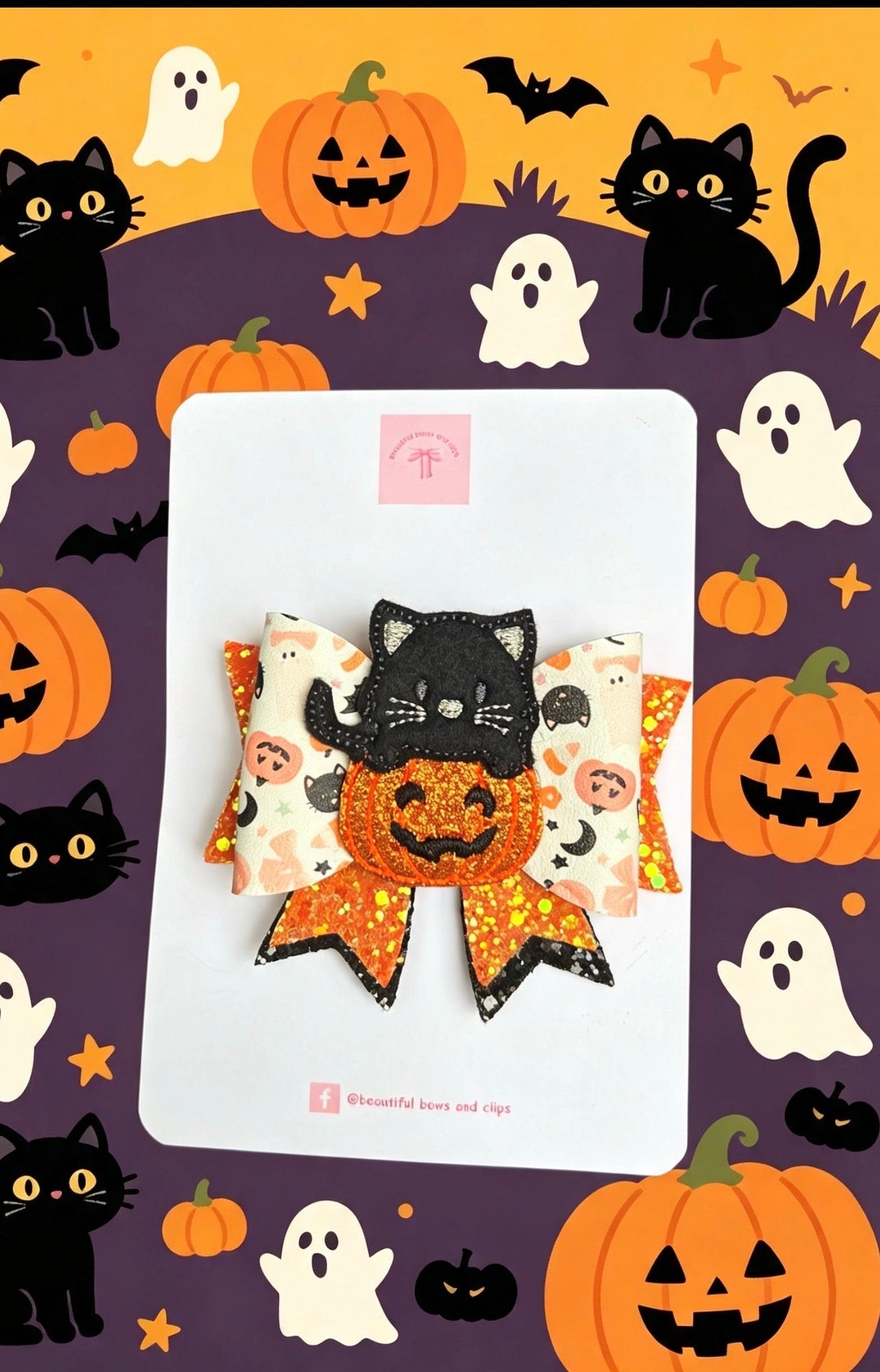 Cat with pumpkin hair bow