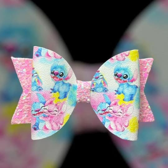 Blue and pink monster hair bow