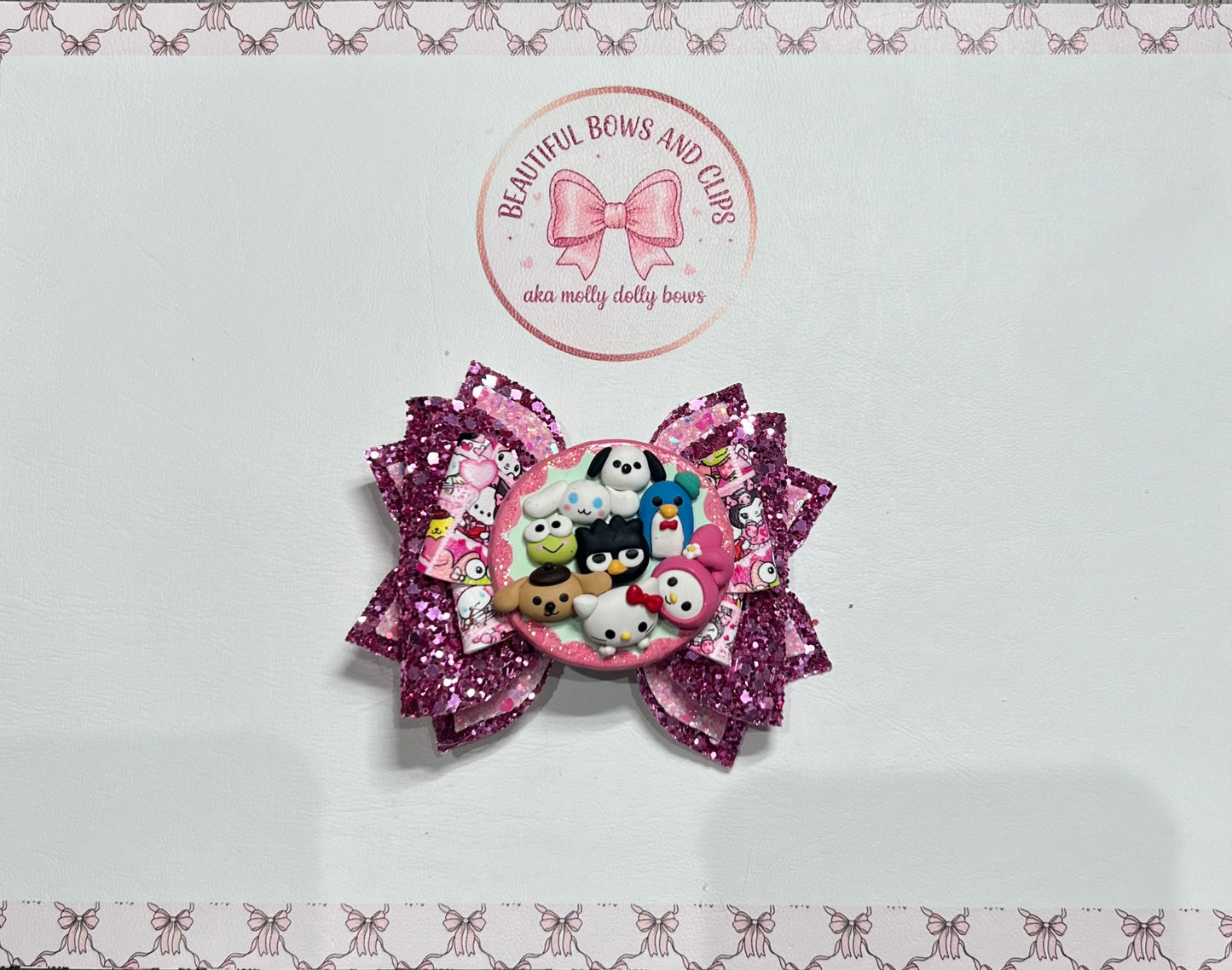 Kitty character hair bow