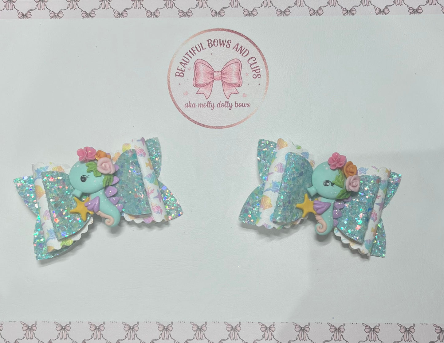 Blue seahorse hair bow