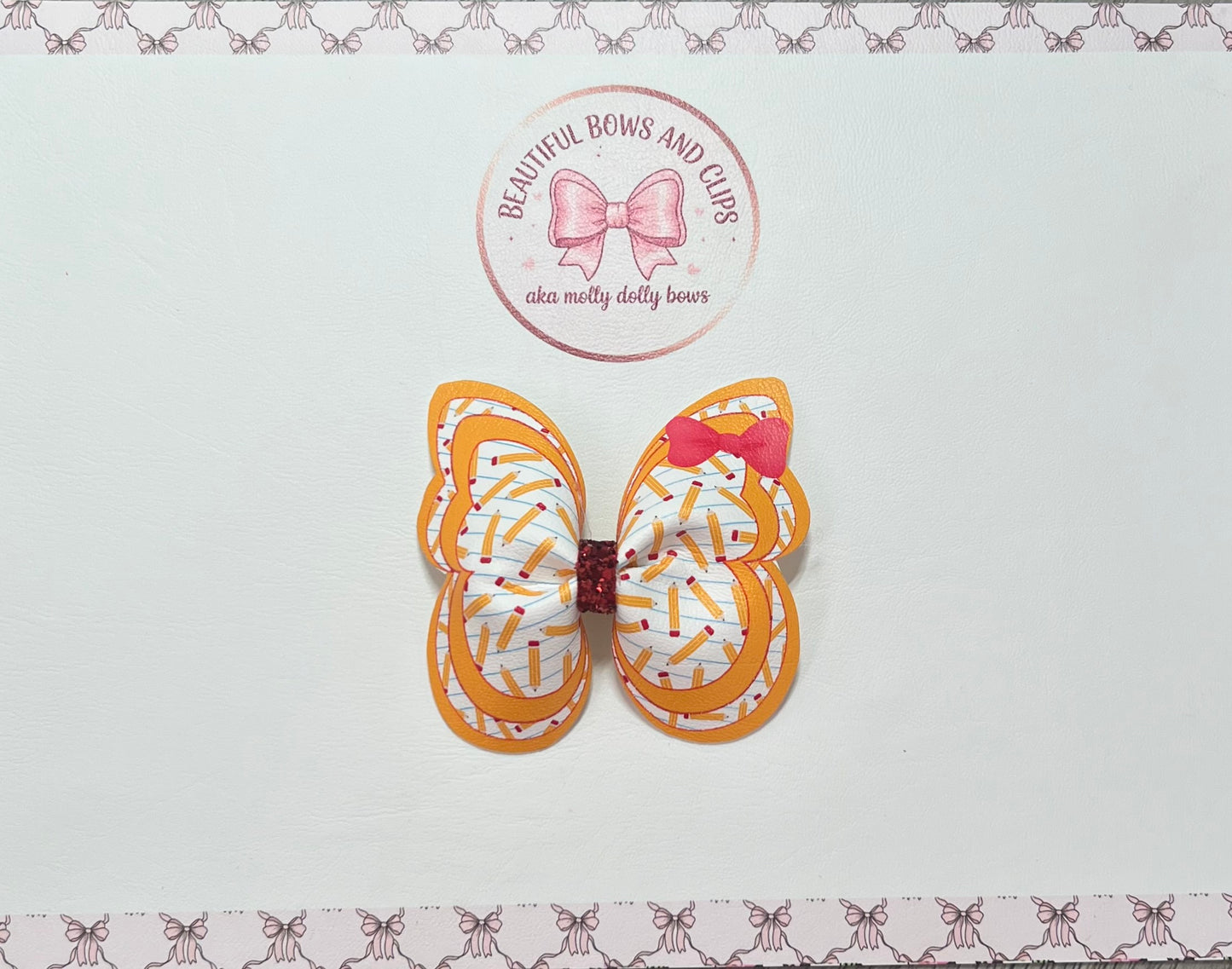 Pencil butterfly hair bow