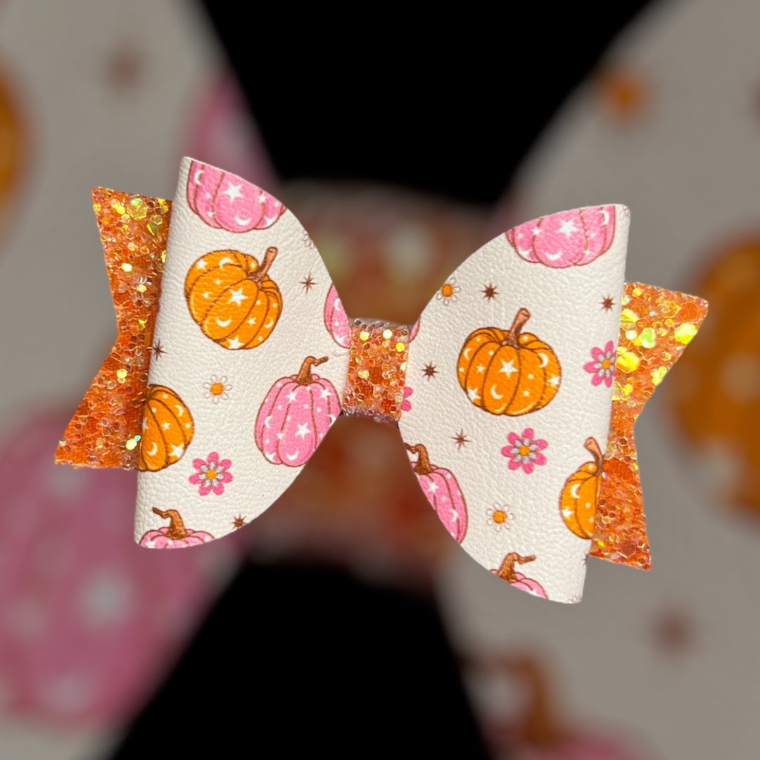 Pink and orange pumpkins hair bow