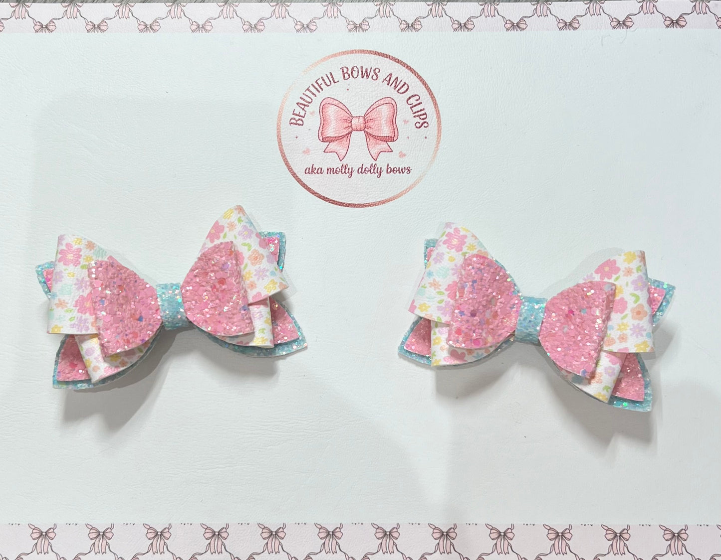 Pink and blue floral hair bow set