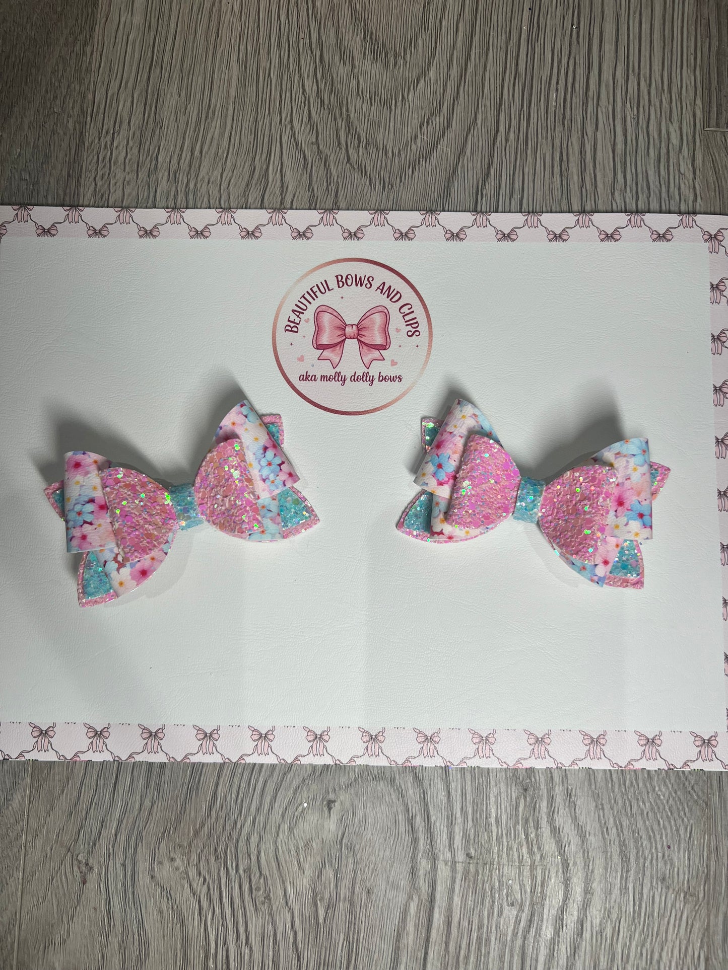 Pink and blue floral hair bow set