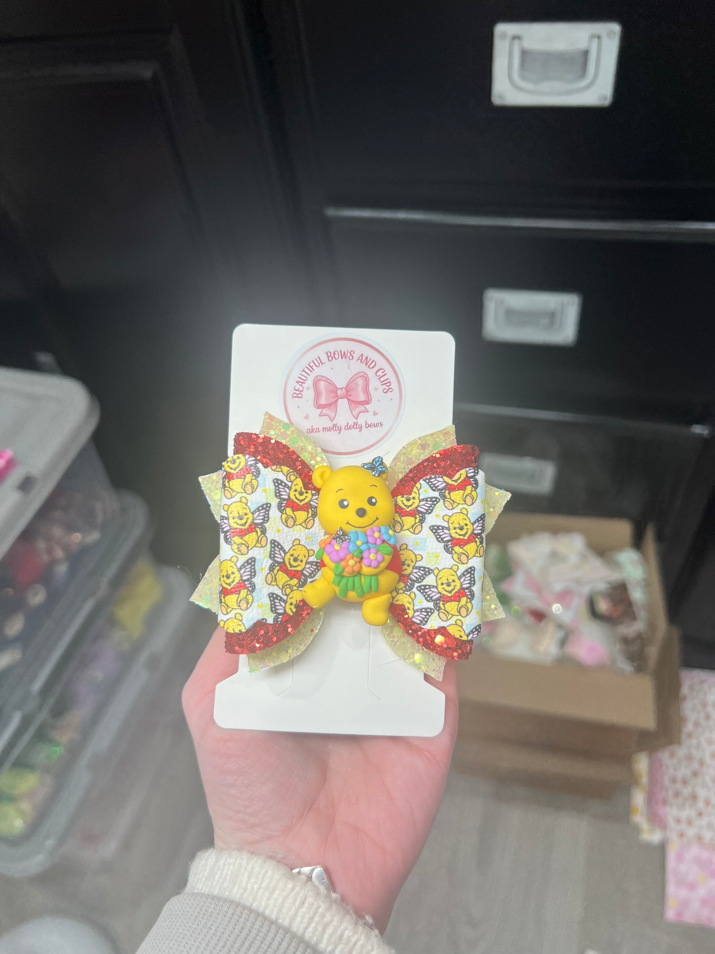 Floral Pooh bear clay hair bow