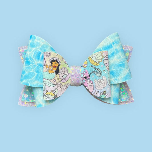 Blue and pink monster hair bow