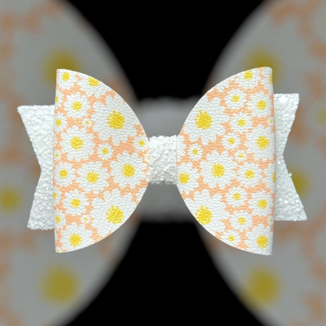 Coral daisies hair bow