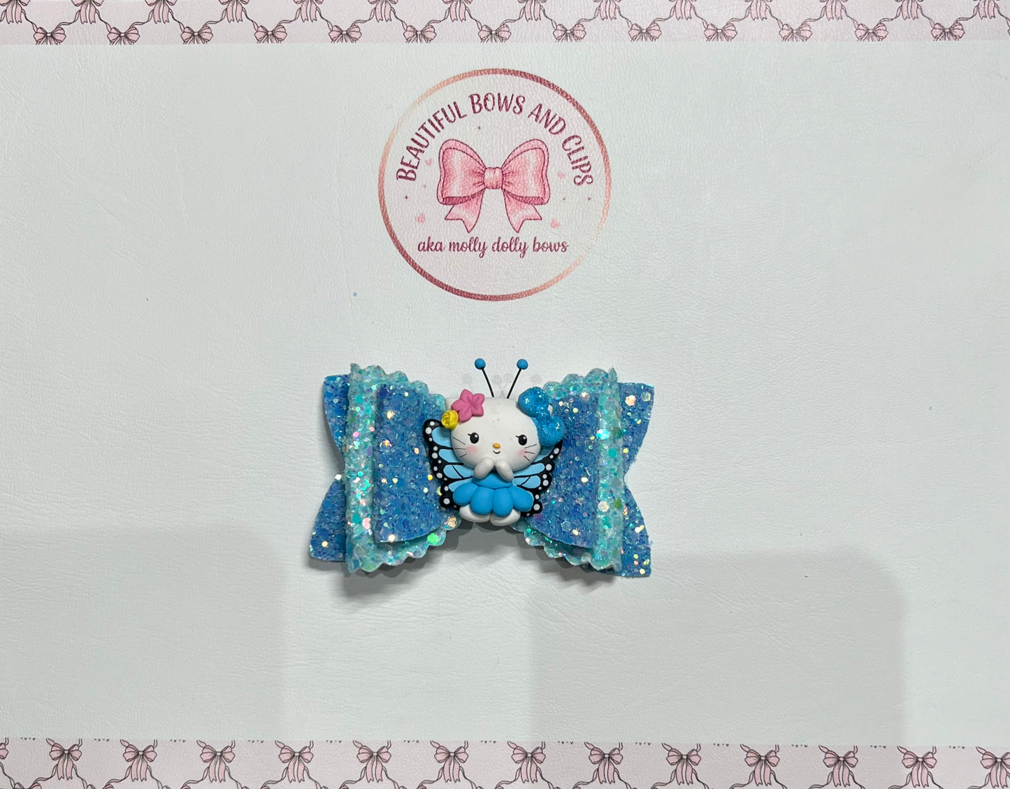 Kitty butterfly blue hair bow