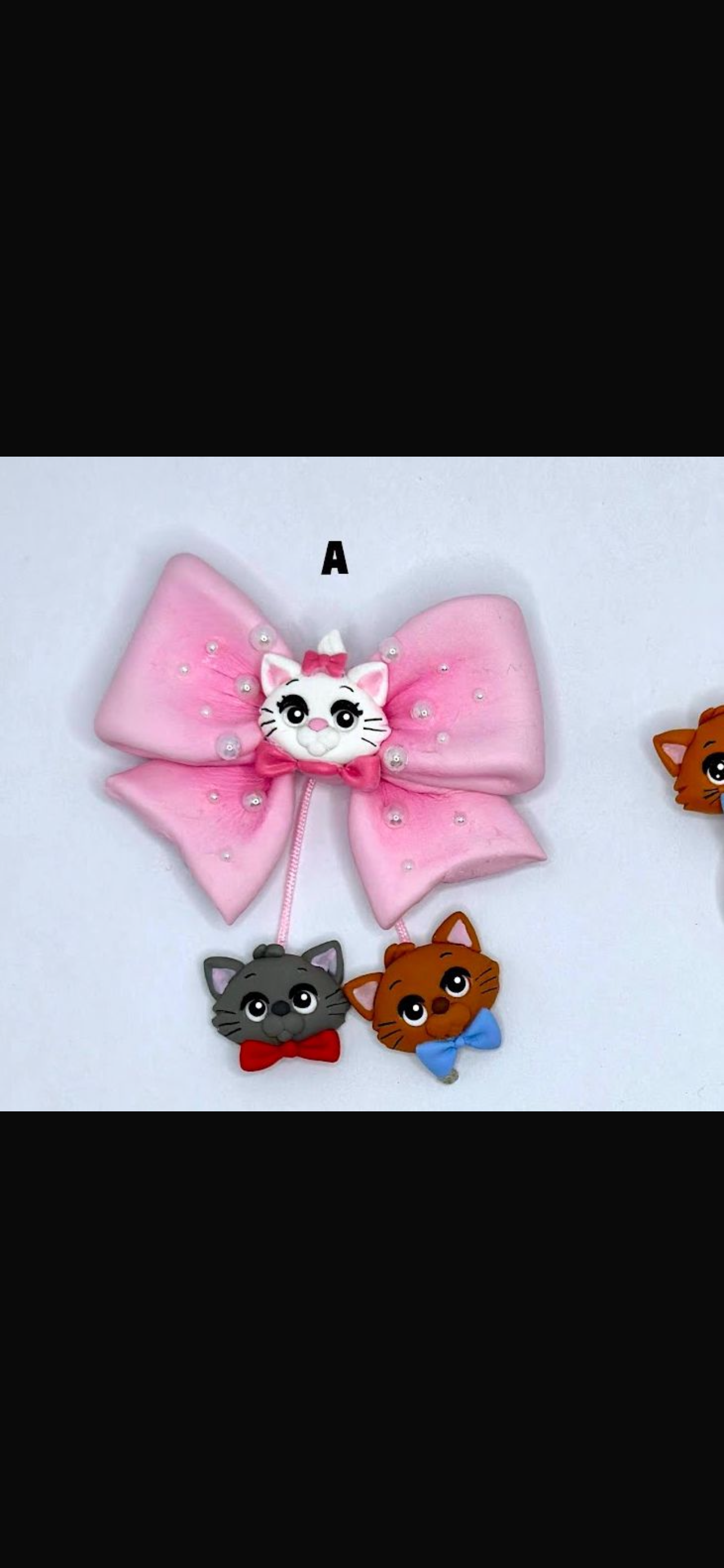 Marie cats hair bow