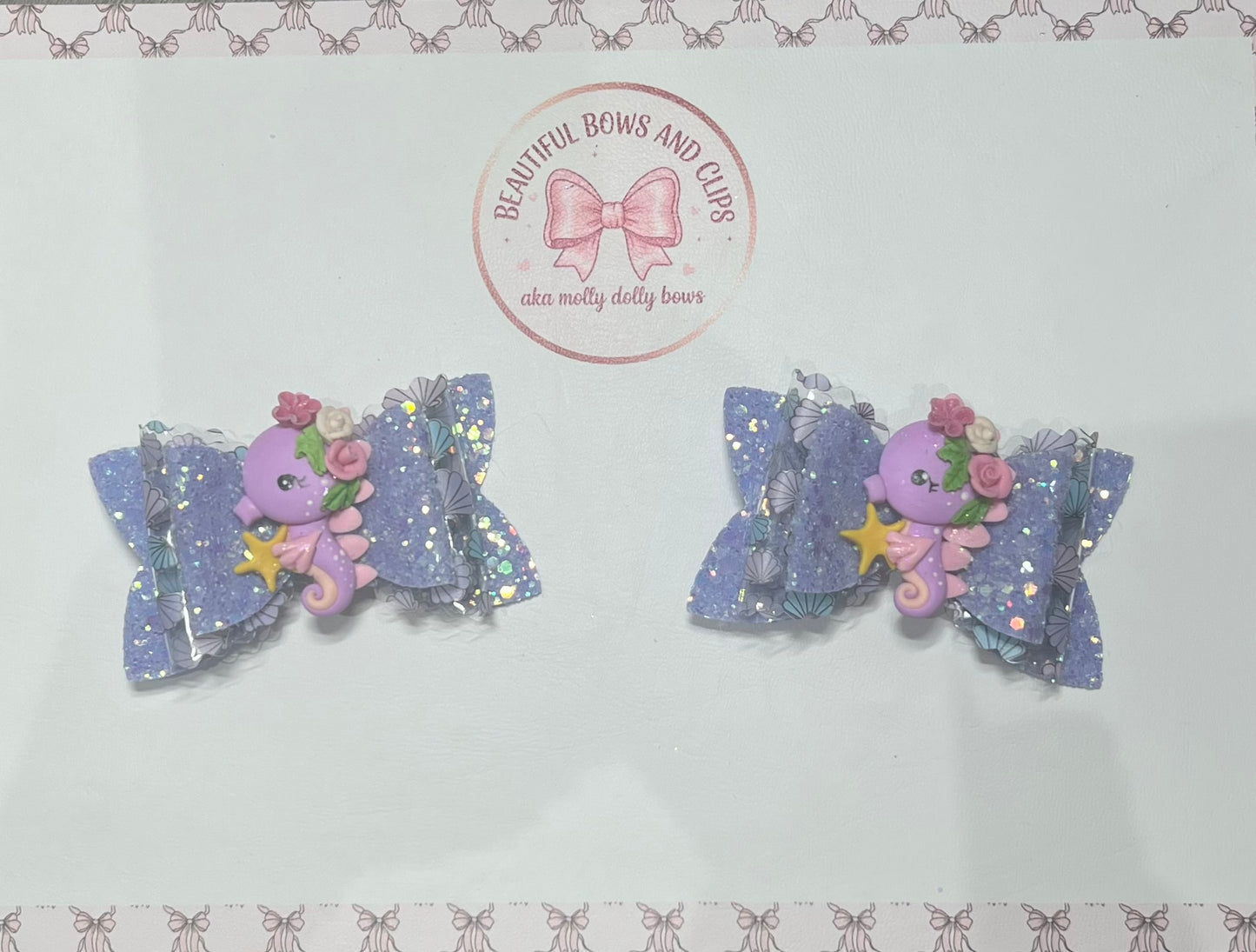 Purple seahorse hair bow