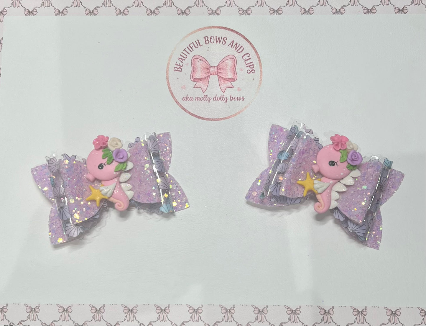 Pink seahorse hair bow