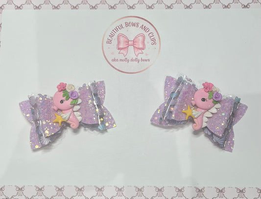 Pink seahorse hair bow