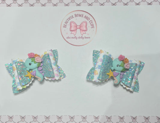 Blue seahorse hair bow