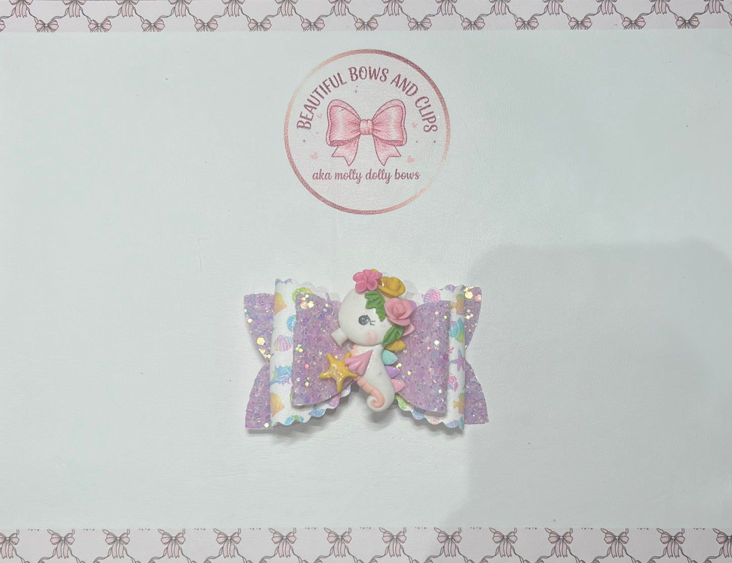 White rainbow seahorse hair bow