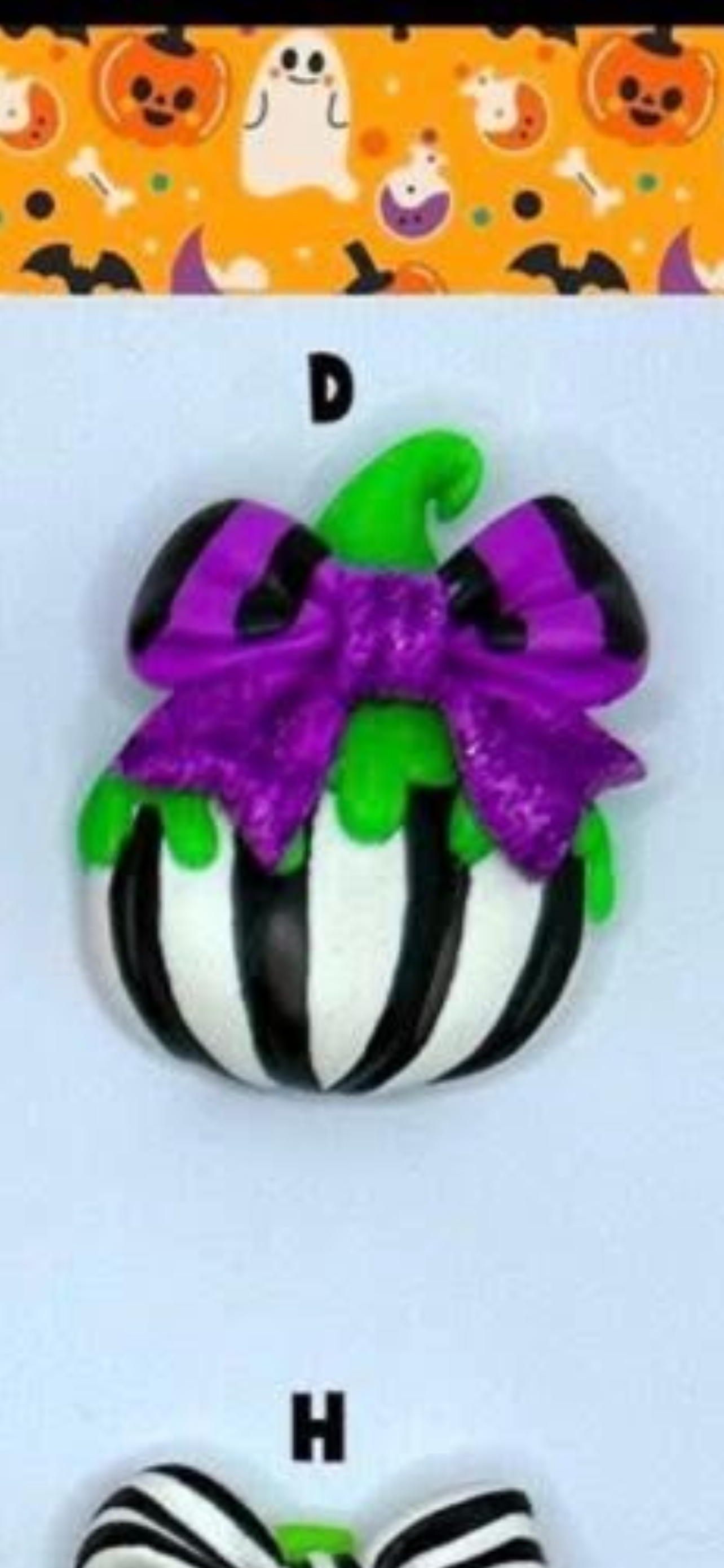Black green white and purple pumpkin hair bow