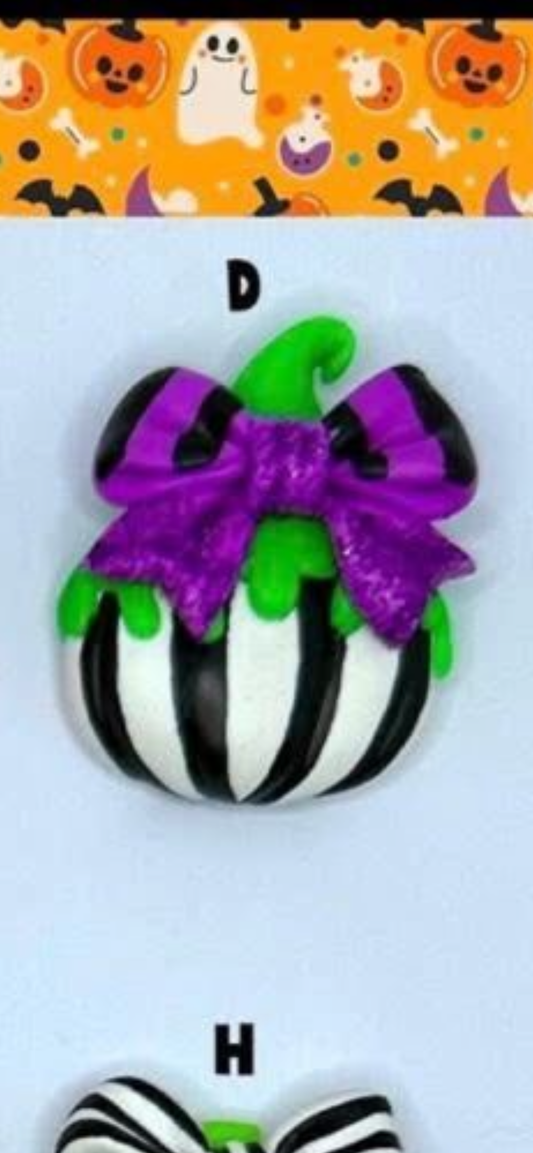 Black green white and purple pumpkin hair bow