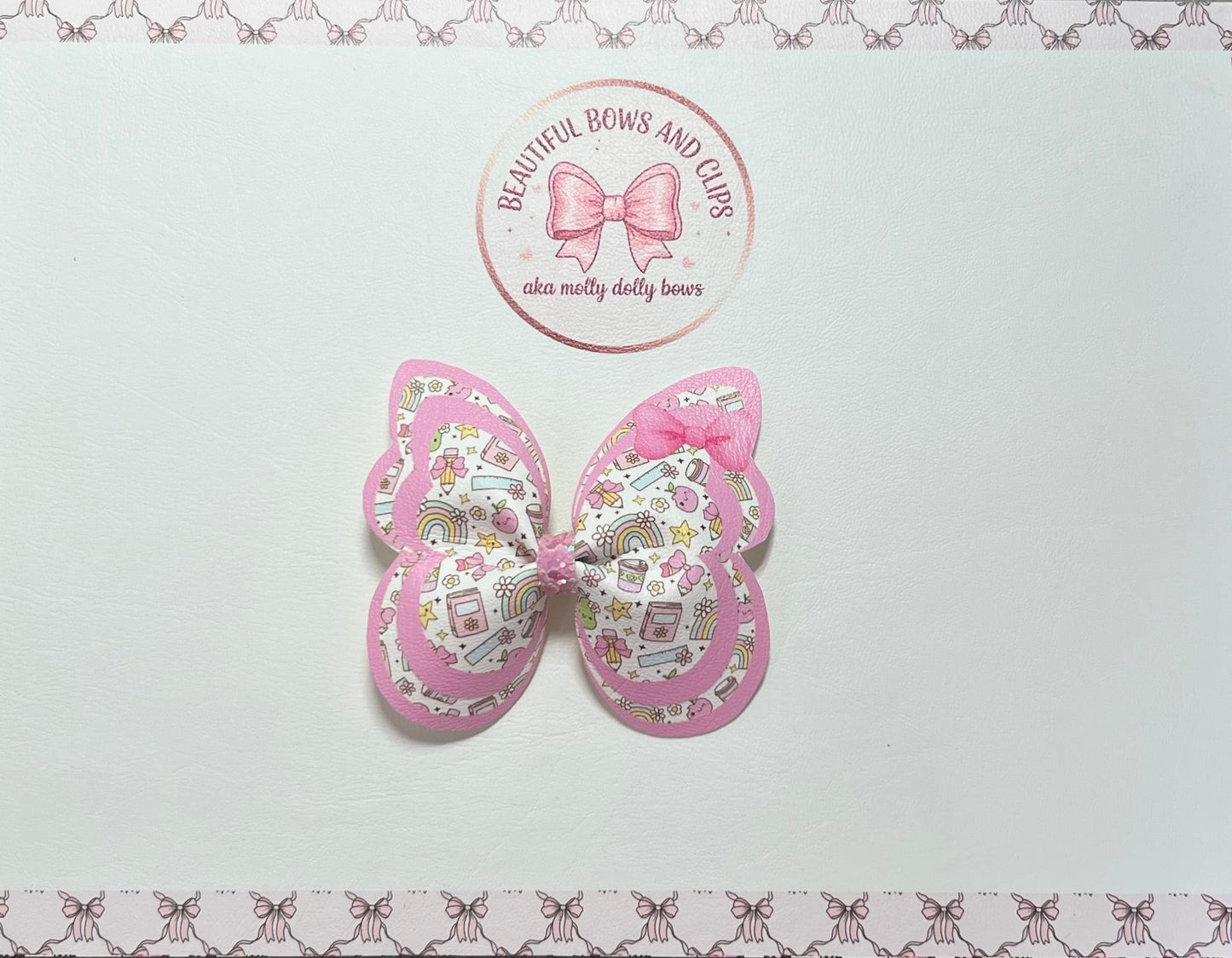 Pink school butterfly hair bow
