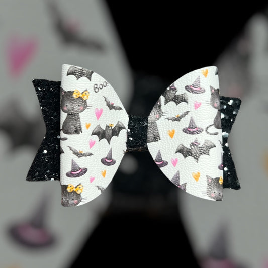 White bats and cats hair bow