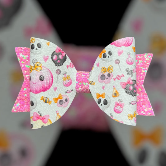 Pumpkin and skulls hair bow